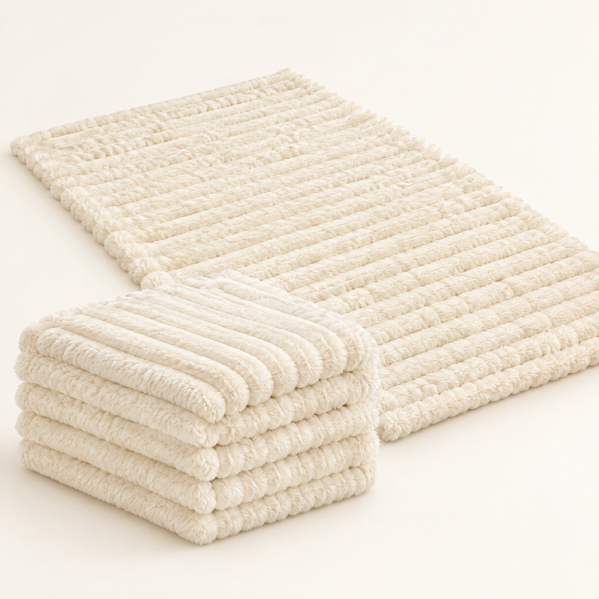 BerraPaws Cozy Cloud Blanket in Cream: one folded, one spread flat, showing the raised plush faux fur ribs